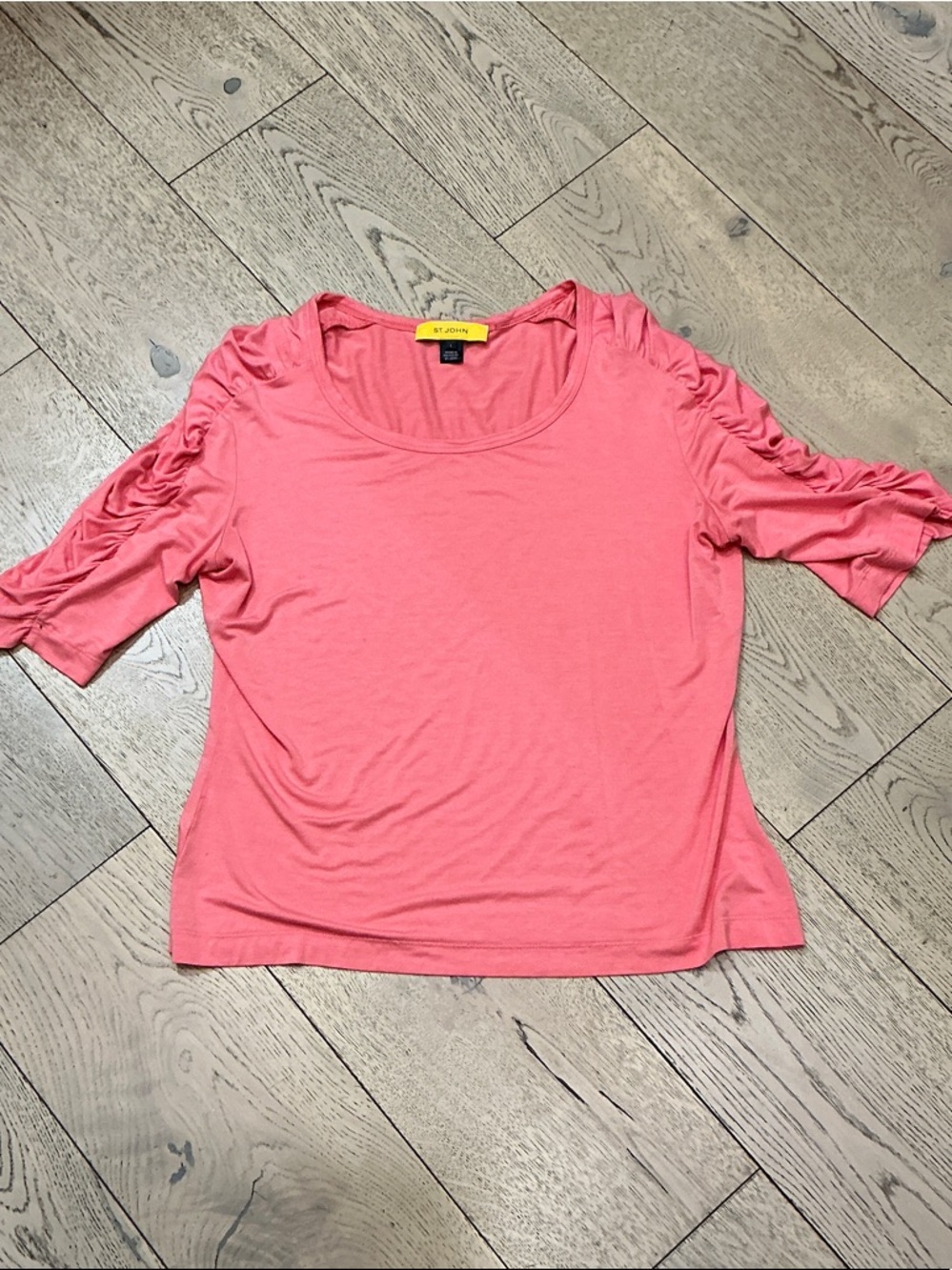 Woman’s St. John peach pull on top. Large. Rushed short sleeve.   Round neck.